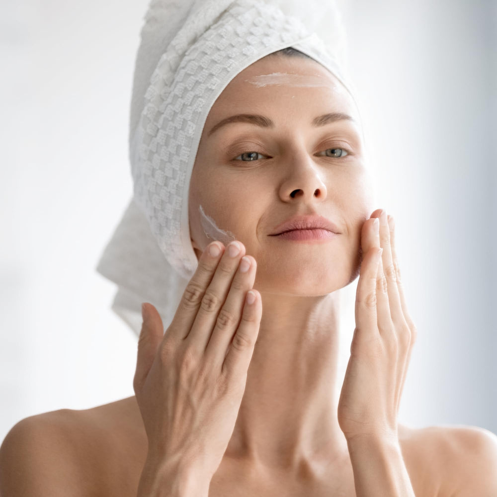 Photozyme bottle on bath tray staged for daily routine convenience benefit