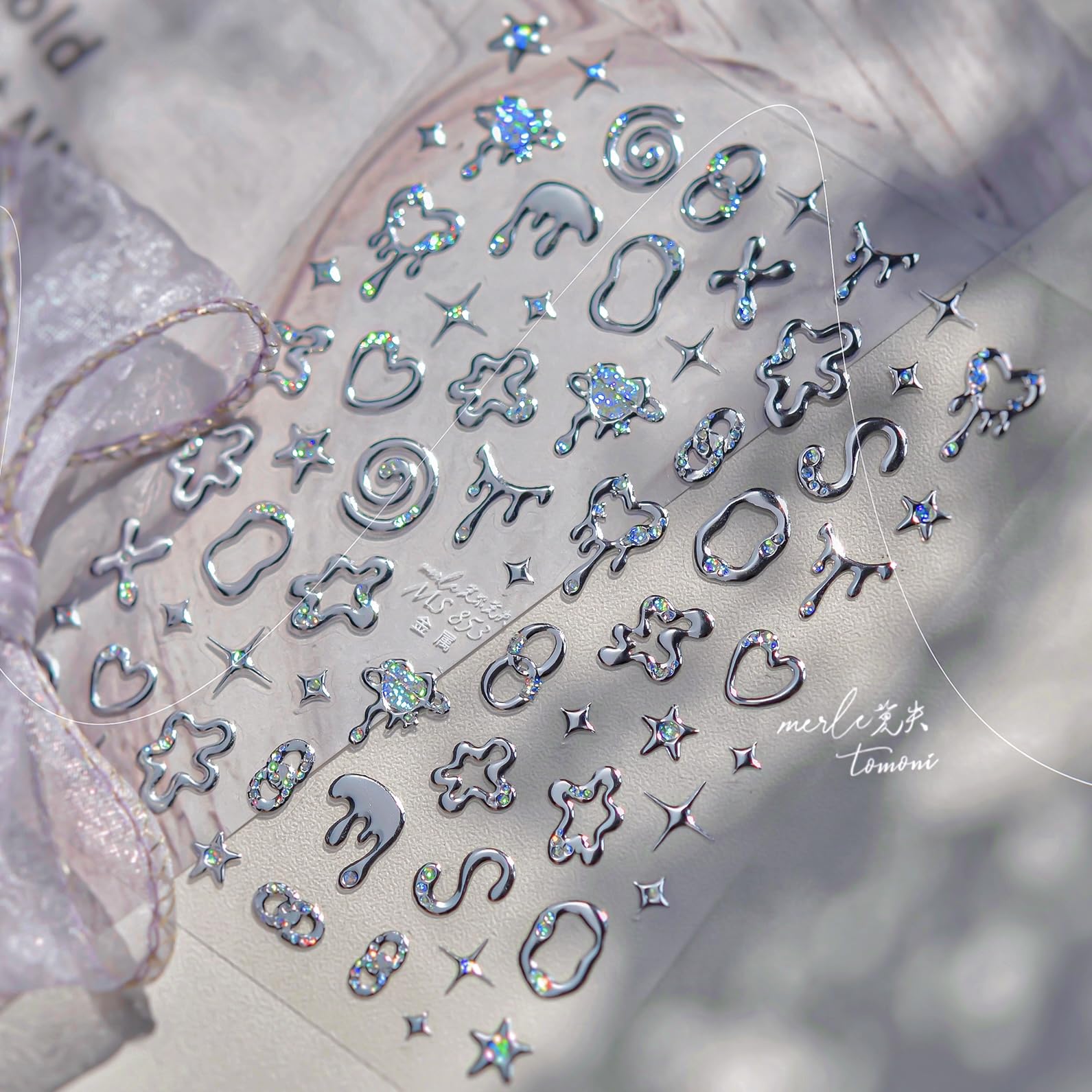 Phuryllic nail charms worn at a party showing festive, eye-catching finish