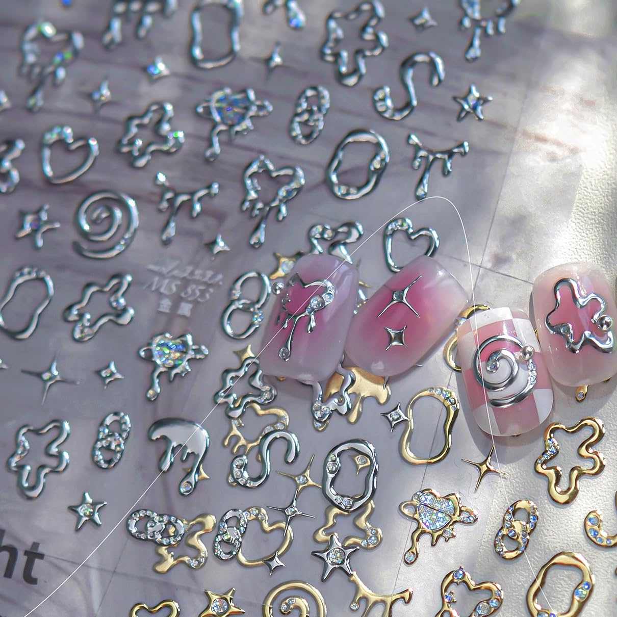 Phuryllic removed sticker on fingertip showing easy removal and reworkability