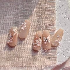 Phuryllic sticker sheets laid out displaying variety of sizes and nail accents