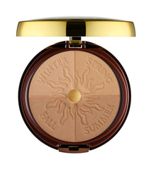 Physicians Formula brush applying bronzer demonstrating easy blending benefit