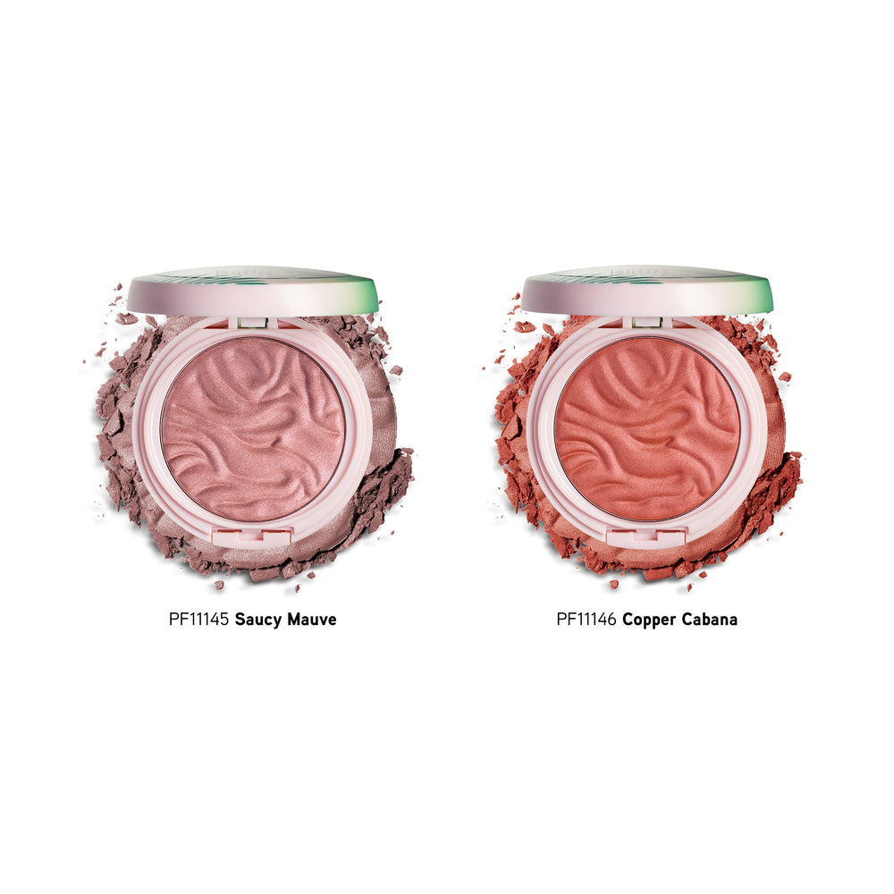 Physicians Formula using brush to blend blush for diffused, natural-looking color benefit