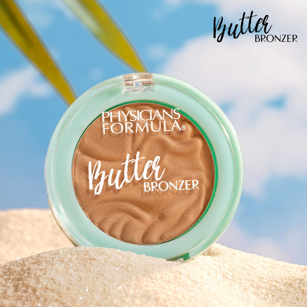 Physicians Formula bronzer next to everyday items showing mini size convenience
