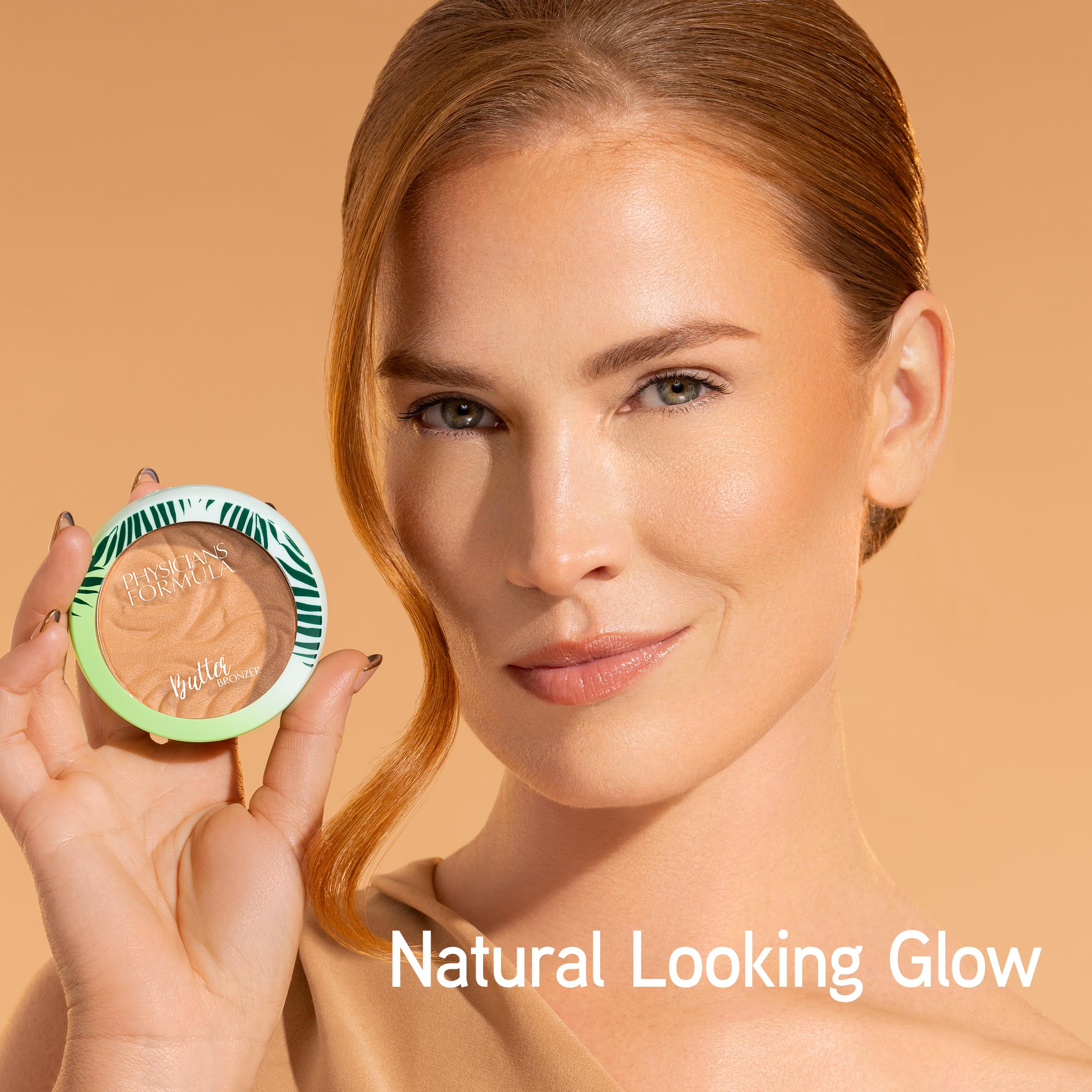 Physicians Formula demonstrating bronzer application on cheeks for warm sculpted glow