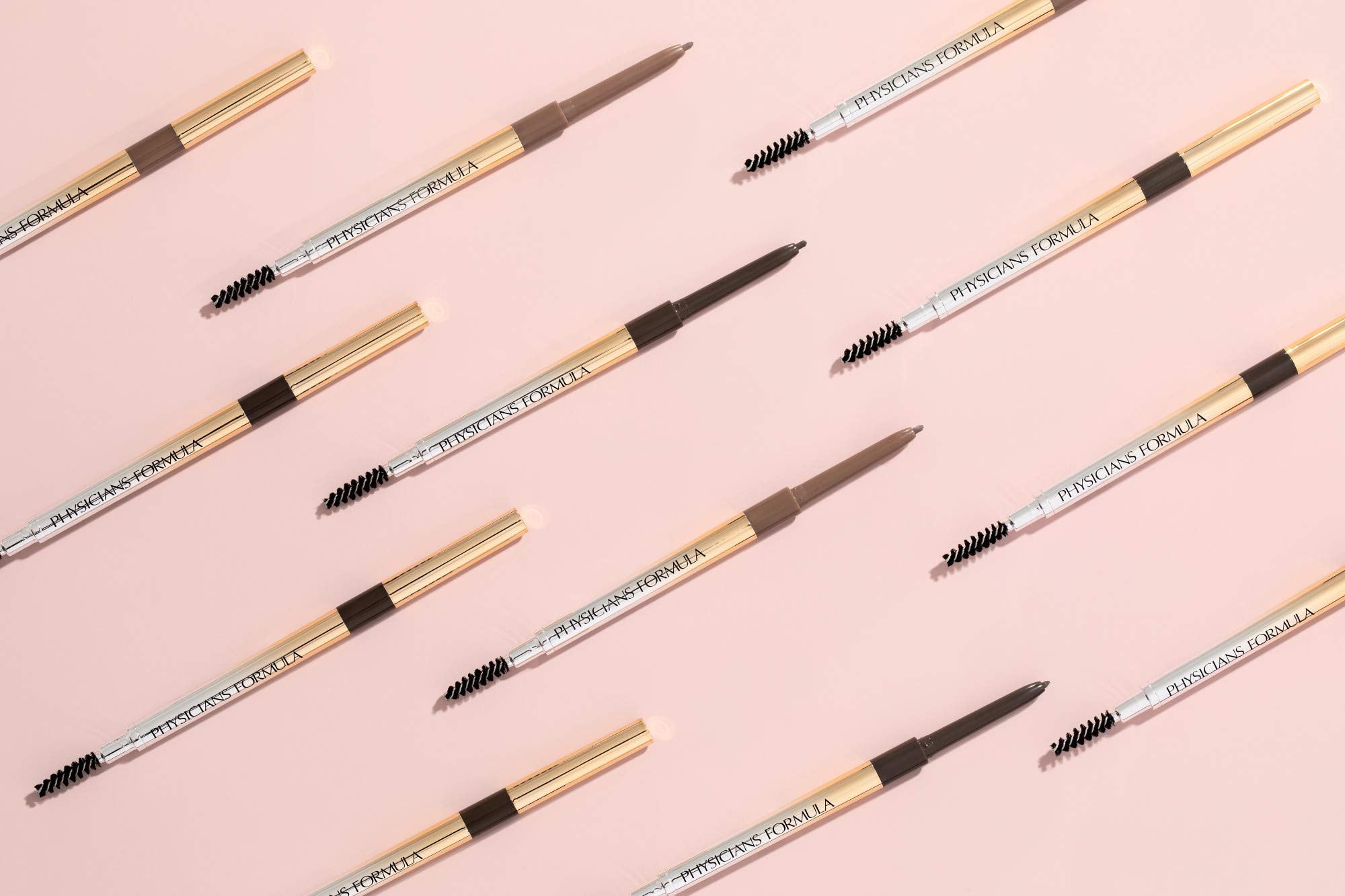 Physicians Formula pencil held in hand to show compact size and control