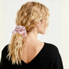 PIDOUDOU blue scrunchie holding a ponytail on model, secure comfortable hold