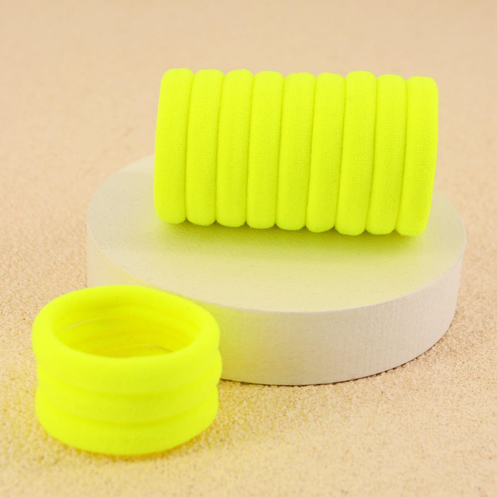 PIDOUDOU securing a thick ponytail, provides comfortable all-day grip
