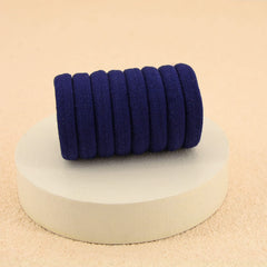 PIDOUDOU hair tie in a woman’s ponytail demonstrating comfortable wear