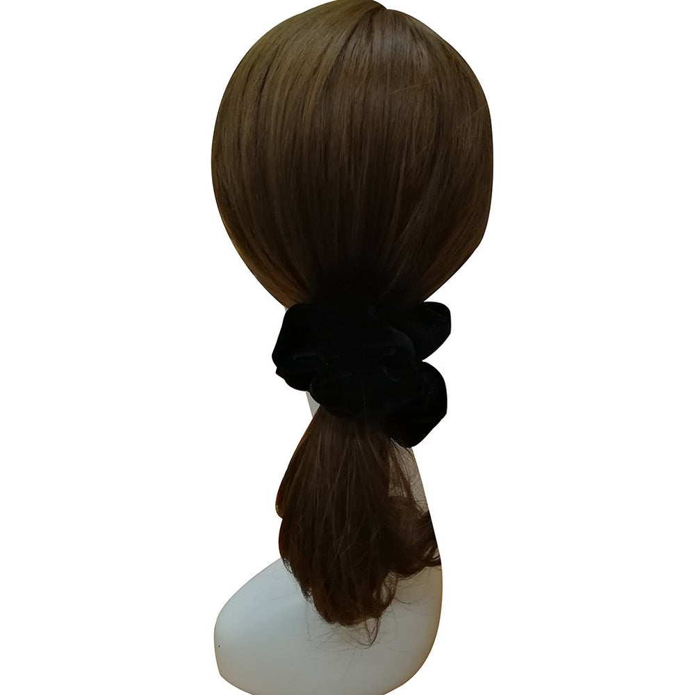 PIDOUDOU scrunchie securing a thick ponytail without slipping or creasing