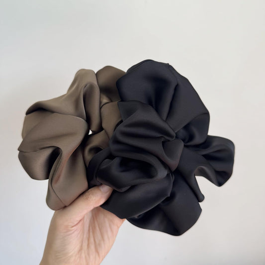 PIDOUDOU close-up of satin fabric texture reducing friction to protect hair health