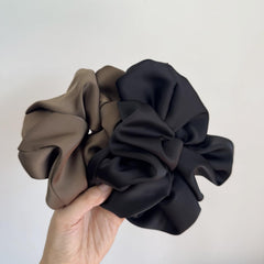 PIDOUDOU close-up of satin fabric texture reducing friction to protect hair health