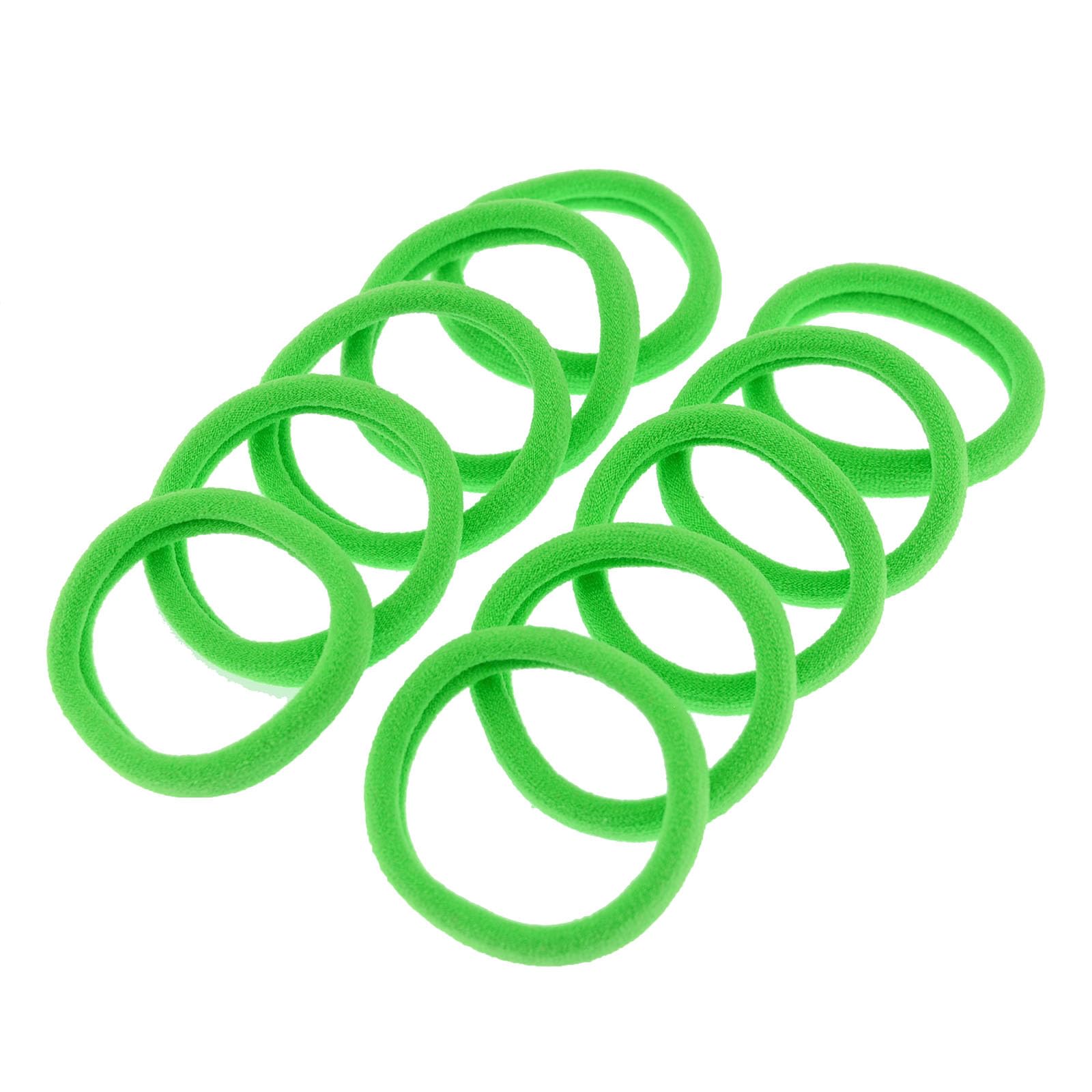 PIDOUDOU hair tie beside a hand to show size and stretch benefit