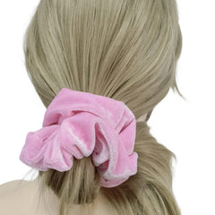 PIDOUDOU scrunchie worn in high ponytail demonstrating secure hold and comfort