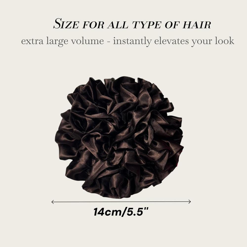 PIDOUDOU scrunchie next to hand shows scale and generous 5.5-inch width benefit