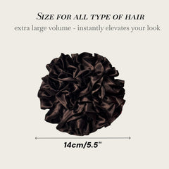 PIDOUDOU scrunchie next to hand shows scale and generous 5.5-inch width benefit
