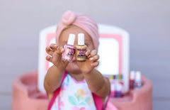 Back label of Piggy Paint listing non-toxic ingredients and reassurance