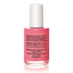 Piggy Paint brush close-up applying polish precisely for even, kid-safe coverage