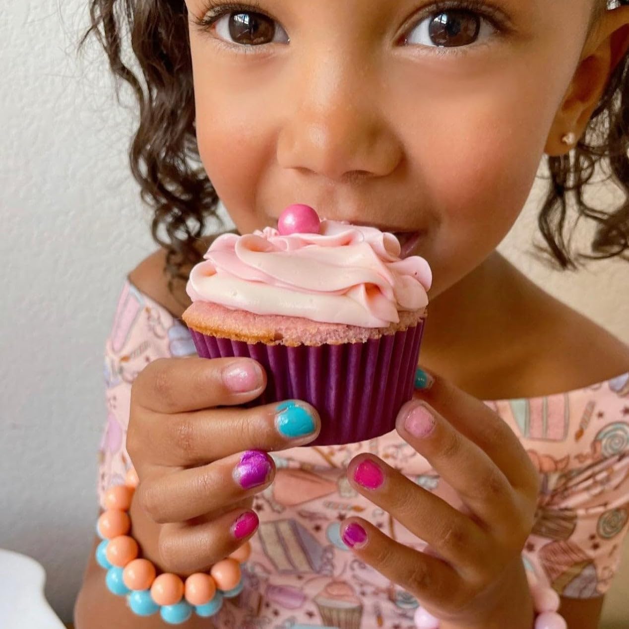 Lifestyle party scene with kids wearing Piggy Paint LOL showing joyful, safe color
