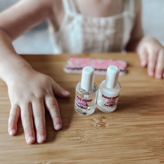Nail art stickers sealed with Piggy Paint topcoat showing longer wear