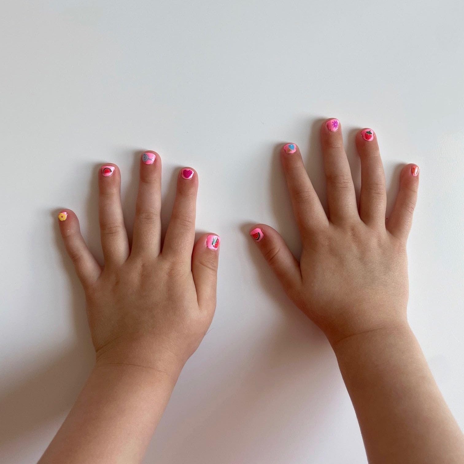Piggy Paint nails drying with hairdryer demonstrating quick set for better wear