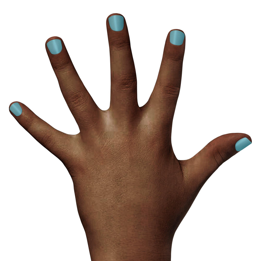 Child wearing Piggy Paint Sea-quin on nails demonstrating safe, playful color