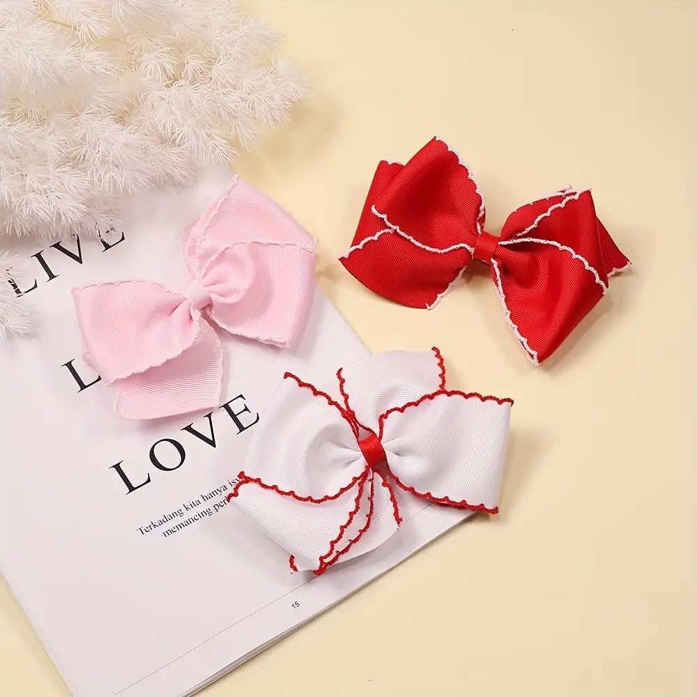 pipajoy rainbow and heart bows arranged to show color coordination and outfit matching