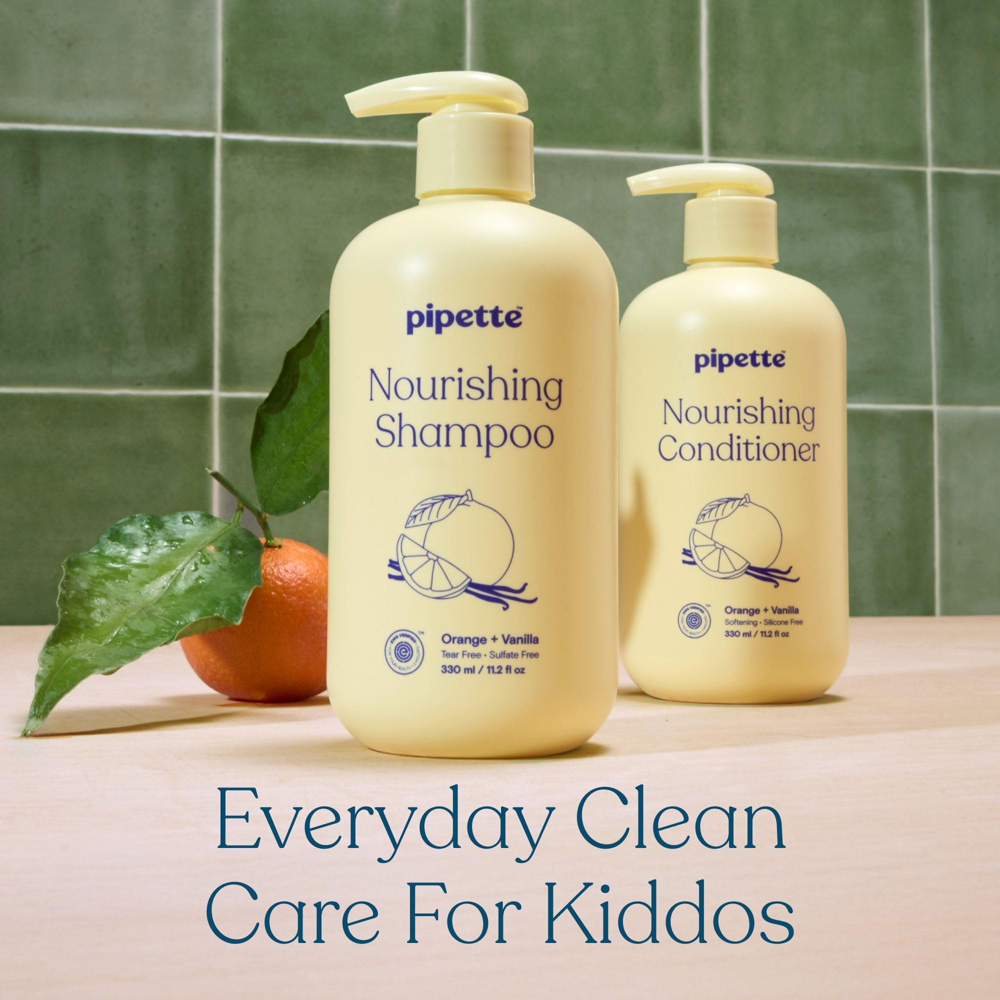 Happy child smelling orange vanilla scent from Pipette detangler for pleasant experience