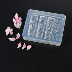 Pizadix resin flower turned into earrings showing cross-craft versatility and wearable result