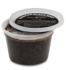 Plant Guru open jar revealing dark paste texture, easy scoop and concentrated formula