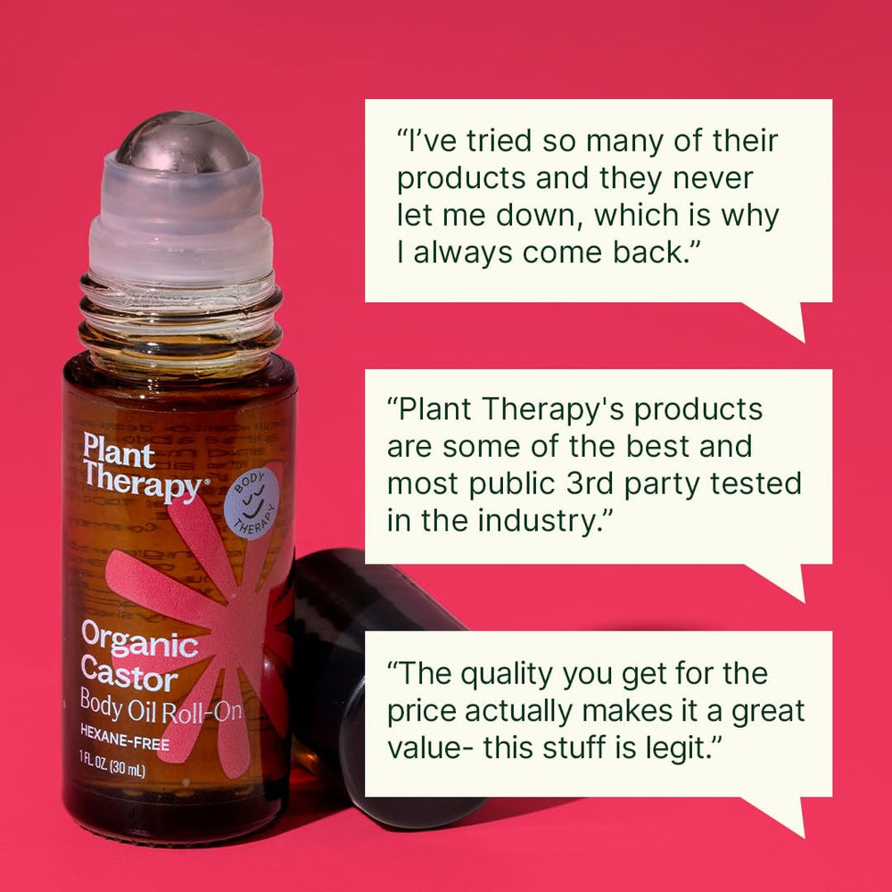 Plant Therapy bottle held in hand for size comparison showing portable 30 mL convenience