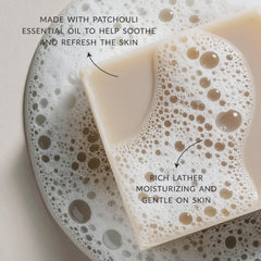 Plantlife patchouli bar soap lather in hand demonstrating gentle cleansing and hydrating foam