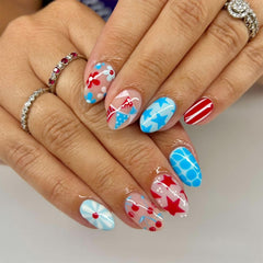 PODUOJIEYI front packaging showing 24-piece patriotic nail set and easy storage benefit