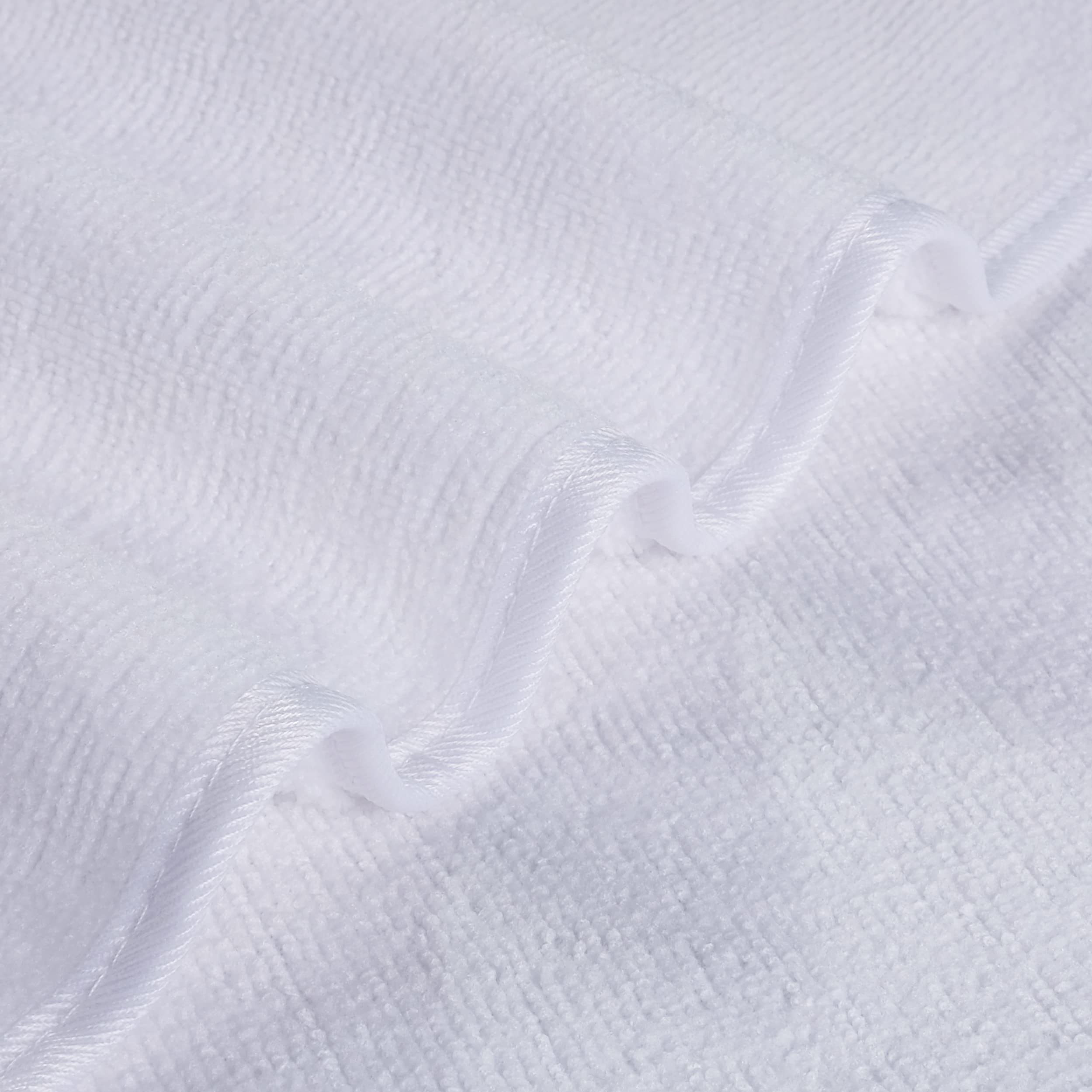 POLYTE 13x13 inch washcloth held in hand to show size and quick-drying lightweight benefit