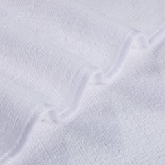 POLYTE 13x13 inch washcloth held in hand to show size and quick-drying lightweight benefit