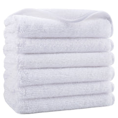 POLYTE front view of six white washcloths showing neat folded stack and clean look, practical storage