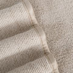 POLYTE washcloth in use cleansing face demonstrating effective makeup removal