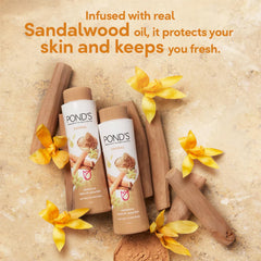 Pond's sandal talc being applied on arm for quick-dry comfort