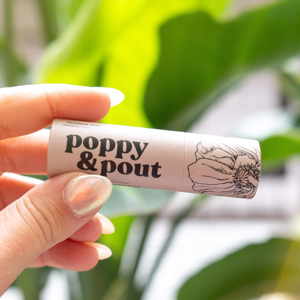 Poppy & Pout recyclable cardboard tube close-up showing eco-friendly benefit