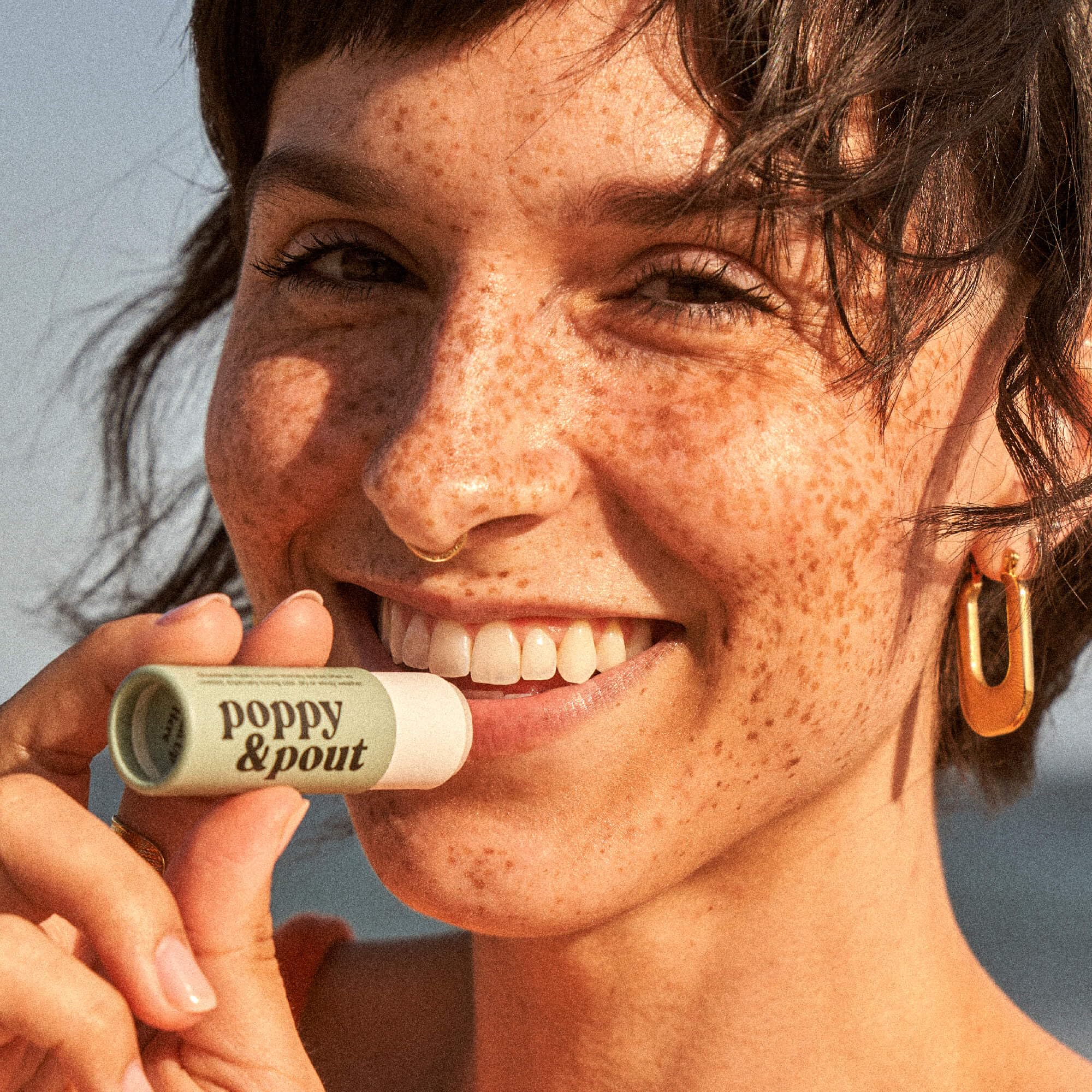 Poppy & Pout cardboard tube detail highlighting recyclable packaging