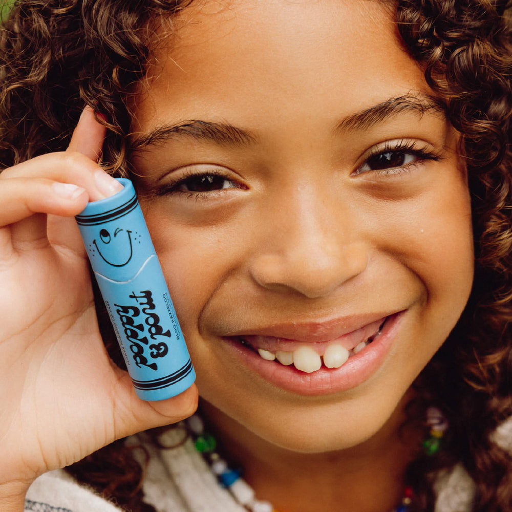 Poppy & Pout balm texture close-up showing smooth beeswax finish for long-lasting moisture