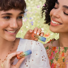 Poppy & Pout Pride Punch applied to lips demonstrating hydration and comfortable finish