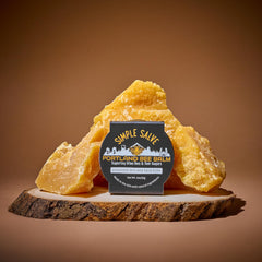 Portland Bee Balm ingredients shot with beeswax and olive oil emphasizing natural sourcing