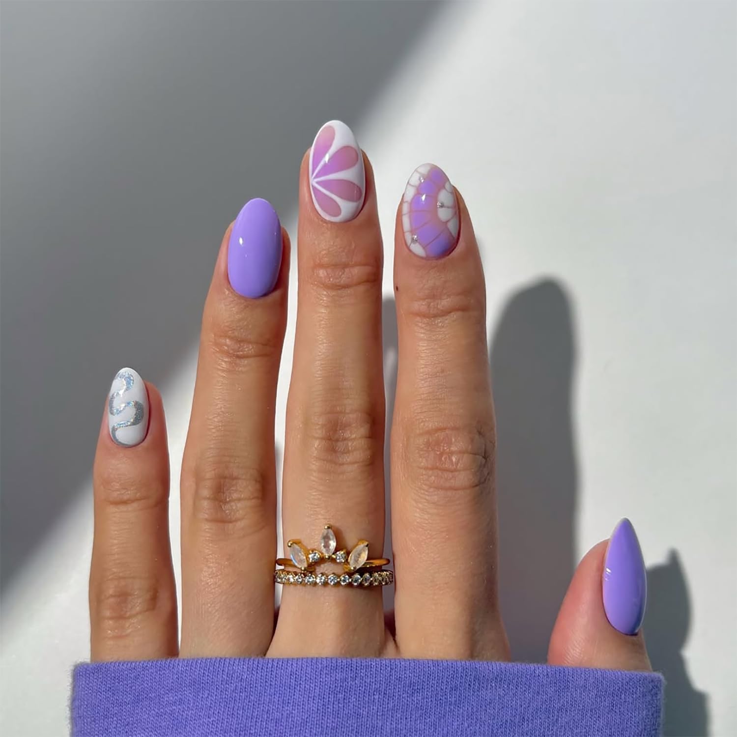 Posyofet front packaging showing purple almond press-on nails and kit, neat presentation benefit