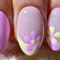 Posyofet nails held in hand for size comparison, illustrating fit and realistic scale
