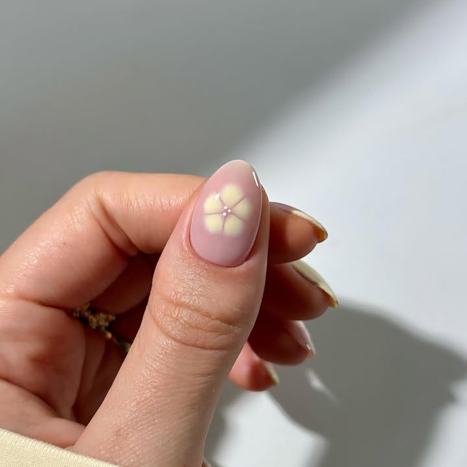 posyofet nails on hand demo showing short almond shape for natural everyday wear