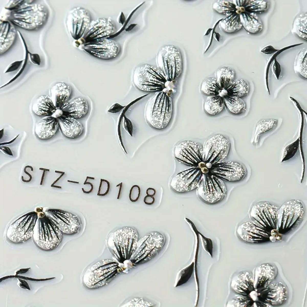 POWPOP tweezers placing decal on nail showing easy precise application for neat results