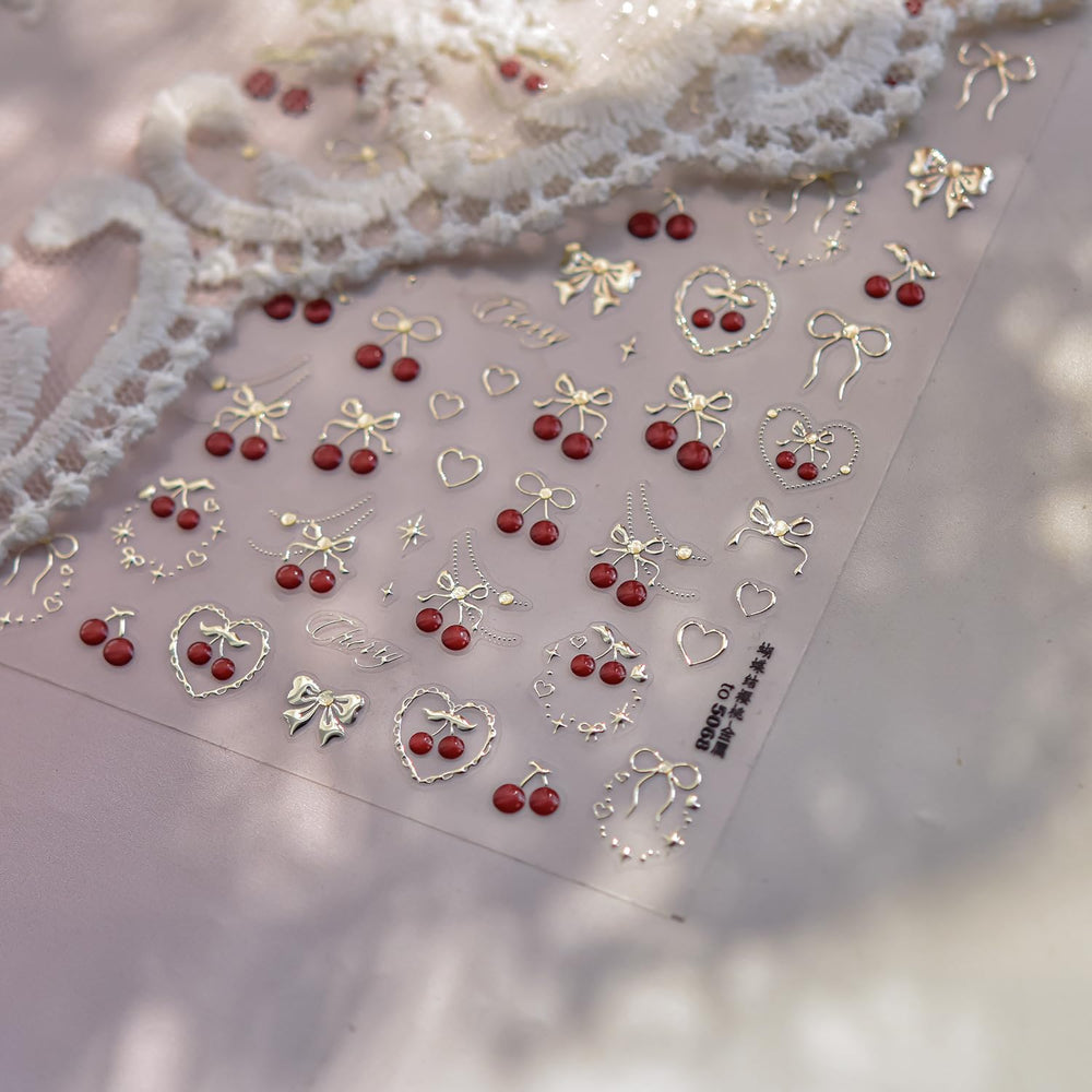 POWPOP close-up of embossed gold cherry detail adding luxe texture and shimmer
