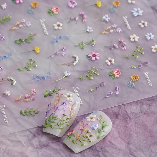 POWPOP front sheet showing colorful floral designs for instant manicures