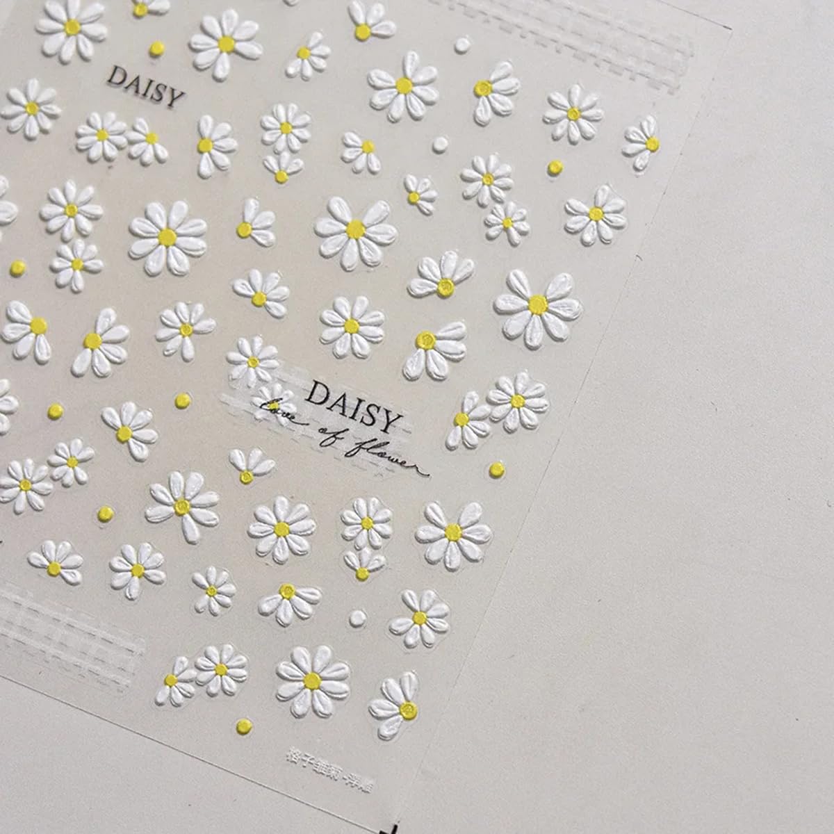 POWPOP on natural nails showing spring design that brightens nails