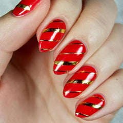POWPOP styled manicure with rose gold accents illustrating glamorous finish